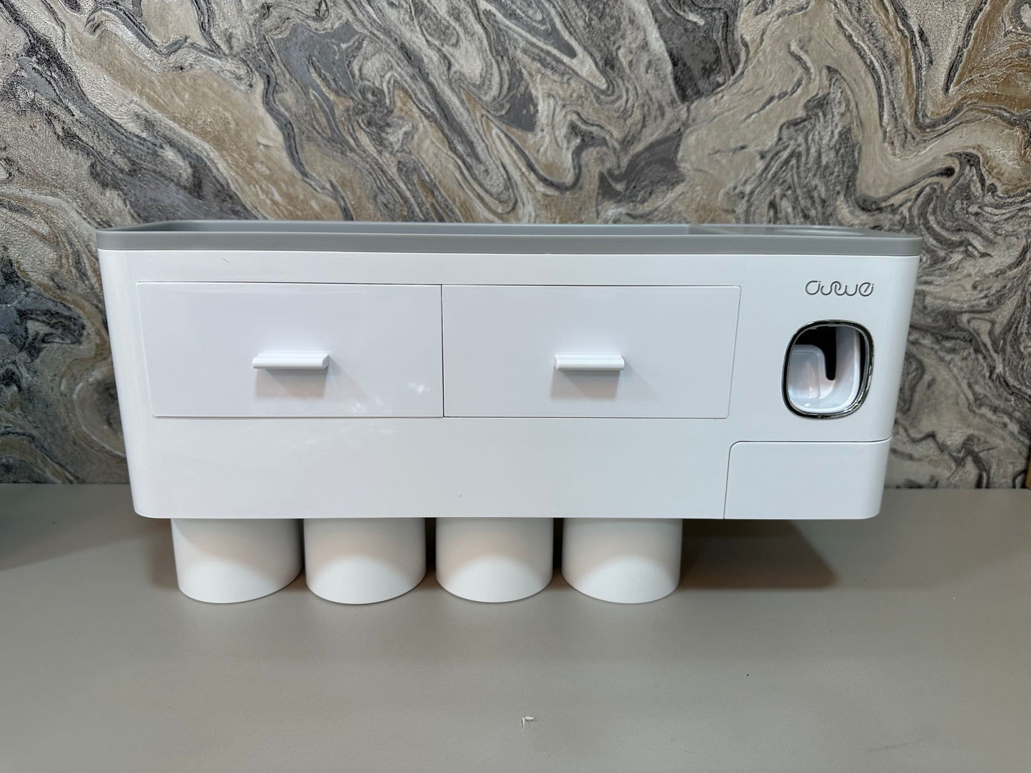 ORGANIZADOR Y DISPENSADOR DE CREMA DENTAL